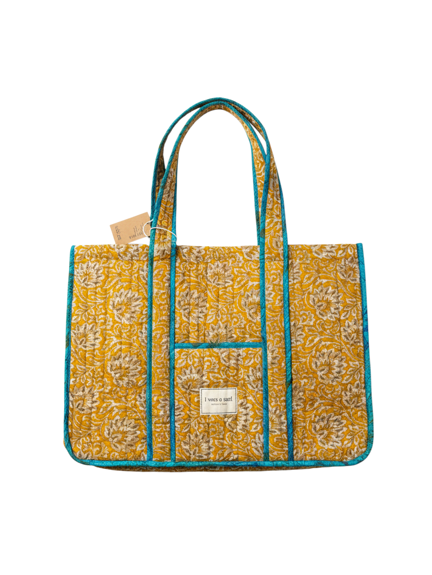 Invogue Again quilted work tote bag in mustard yellow floral sari fabric with contrasting teal blue piping and straps.